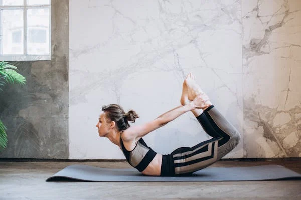 advantages of dhanurasana